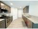 Bright kitchen with stainless steel appliances and ample cabinet space at 2241 Chandler Ranch Pl, Laughlin, NV 89029