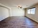 Expansive living room with modern flooring, large windows, and natural light at 2241 Chandler Ranch Pl, Laughlin, NV 89029