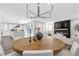 Open-concept dining area, with a view into the living room and kitchen at 2493 Verdello St, Henderson, NV 89044