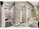 Bathroom featuring multiple shower stalls with tiled walls and floors at 2700 Las Vegas Blvd # 1604, Las Vegas, NV 89109