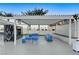 Enjoy this outdoor lounge area featuring comfortable seating, ceiling fans, and a pergola at 2700 Las Vegas Blvd # 1604, Las Vegas, NV 89109