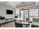 A relaxing lounge area showcases comfortable seating with floor to ceiling windows that lead to a covered balcony at 2700 Las Vegas Blvd # 1604, Las Vegas, NV 89109