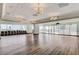 Large meeting room with hardwood floors, expansive windows, and comfortable seating at 2700 Las Vegas Blvd # 1604, Las Vegas, NV 89109