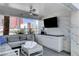 Stylish outdoor patio space with comfortable seating, TV and city views at 2700 Las Vegas Blvd # 1604, Las Vegas, NV 89109