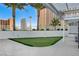 Enjoy skyline views from the putting green on the rooftop deck surrounded by city buildings at 2700 Las Vegas Blvd # 1604, Las Vegas, NV 89109