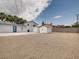 Spacious backyard featuring two storage sheds at 2712 Royal St, North Las Vegas, NV 89030