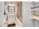 Updated bathroom features a shower-tub combo, a modern vanity, and ample storage at 2712 Royal St, North Las Vegas, NV 89030