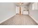 Bright living room showcasing wood-look floors, fresh paint, and ample natural light at 2712 Royal St, North Las Vegas, NV 89030