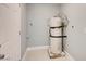 A utility room showing the water heater in a room off the house at 2712 Royal St, North Las Vegas, NV 89030