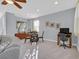 Cozy dining area featuring a round table, carpeted floors, and natural light at 3037 Villanelle Ave, Henderson, NV 89044