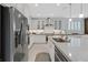 Modern kitchen featuring stainless steel appliances, an island with seating, and plenty of counter space at 3037 Villanelle Ave, Henderson, NV 89044