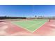 Community tennis courts featuring well-maintained surface and net with lighting at 3037 Villanelle Ave, Henderson, NV 89044