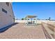 Backyard pergola featuring a table and chairs plus a built-in grill at 3109 Bangor Ct, Las Vegas, NV 89134