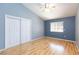 Bedroom features a vaulted ceiling, wood floors, and a window at 3109 Bangor Ct, Las Vegas, NV 89134