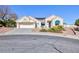 Charming single-story home featuring desert landscaping, a two car garage and solar panels at 3109 Bangor Ct, Las Vegas, NV 89134