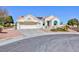 Charming single-story home featuring desert landscaping, a two car garage and solar panels at 3109 Bangor Ct, Las Vegas, NV 89134