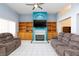 Bright living room with a fireplace, built-in shelving, and comfortable seating at 3109 Bangor Ct, Las Vegas, NV 89134