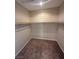 Walk-in closet with carpeted flooring and built-in shelving at 3177 Rabbit Creek Dr, Las Vegas, NV 89120