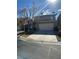 Two-story home featuring an attached two-car garage, desert landscaping, and a concrete driveway at 3177 Rabbit Creek Dr, Las Vegas, NV 89120