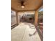 Covered patio featuring concrete flooring and view of the rock-landscaped backyard at 3177 Rabbit Creek Dr, Las Vegas, NV 89120