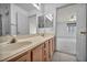 Bathroom with a double vanity sink and view to the main bedroom at 3412 Winterhaven St # 101, Las Vegas, NV 89108