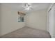 Bedroom with neutral carpet, a window with blinds, and closet with sliding doors at 3412 Winterhaven St # 101, Las Vegas, NV 89108