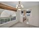 Bright dining area with large window and a view of the kitchen at 3412 Winterhaven St # 101, Las Vegas, NV 89108