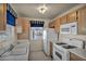 Cozy kitchen featuring standard appliances, tile flooring, and wood cabinets at 3412 Winterhaven St # 101, Las Vegas, NV 89108