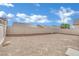 Large fenced in backyard with desert landscaping at 3941 Yellow Mandarin Ave, North Las Vegas, NV 89081