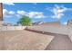 Large fenced in backyard with desert landscaping at 3941 Yellow Mandarin Ave, North Las Vegas, NV 89081