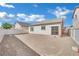 Large fenced in backyard with desert landscaping and access to the home at 3941 Yellow Mandarin Ave, North Las Vegas, NV 89081