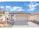 Inviting single-story home with attached two-car garage and neutral exterior paint at 3941 Yellow Mandarin Ave, North Las Vegas, NV 89081