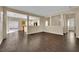 Open-concept living room featuring hardwood floors and ample natural light at 3941 Yellow Mandarin Ave, North Las Vegas, NV 89081