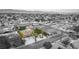 Aerial view of a single story house with a landscaped yard in an established neighborhood at 4412 Denia Cir, Las Vegas, NV 89108