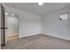 Bright bedroom featuring neutral carpet and open closet at 4412 Denia Cir, Las Vegas, NV 89108