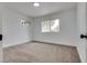 Bedroom with neutral carpet and bright windows at 4412 Denia Cir, Las Vegas, NV 89108