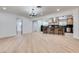 Modern kitchen with island, black countertops, stainless steel appliances and open layout at 4412 Denia Cir, Las Vegas, NV 89108