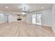 Expansive open living area with recessed lights and sliding glass doors to the backyard at 4412 Denia Cir, Las Vegas, NV 89108