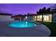 Backyard pool with covered outdoor living space perfect for entertaining at 4412 Denia Cir, Las Vegas, NV 89108