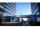 A striking entrance to the Panorama building, adorned with blue accents and sleek architectural design at 4515 Dean Martin Dr # 201, Las Vegas, NV 89103