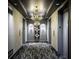 Luxurious elevator lobby featuring a modern chandelier and elegant decor at 4515 Dean Martin Dr # 201, Las Vegas, NV 89103