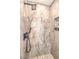 Shower shows large stone tiles, dark fixtures, and built-in shower niche at 4515 Dean Martin Dr # 201, Las Vegas, NV 89103