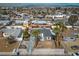 An aerial view of a home, a fenced backyard, mature landscaping and neighborhood at 4606 Cory Pl, Las Vegas, NV 89107