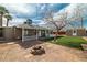 Backyard showing patio, a shed and a low-maintenance yard. There is also a firepit at 4606 Cory Pl, Las Vegas, NV 89107