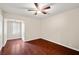 A bedroom featuring wood floors and a ceiling fan at 4606 Cory Pl, Las Vegas, NV 89107