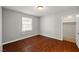 The bedroom has a window for natural light and wood floors at 4606 Cory Pl, Las Vegas, NV 89107