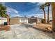 Single story home with mature landscaping featuring a large front yard at 4606 Cory Pl, Las Vegas, NV 89107