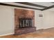 Close up view of the brick fireplace in the living room at 4606 Cory Pl, Las Vegas, NV 89107