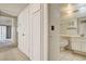 Bright bathroom features a single vanity and tile flooring at 4648 Comnor Hill Ln, Las Vegas, NV 89121