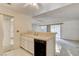 Kitchen featuring tile countertops, ample cabinet space, and neutral color palette at 4648 Comnor Hill Ln, Las Vegas, NV 89121